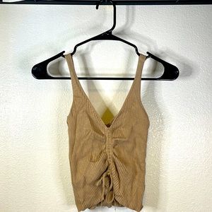 Tank top with scrunched tie down the middle.